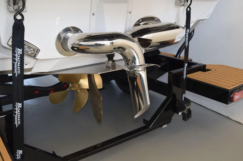 Slide: The Image of 2026 Nautique Super Air Nautique G25 Paragon boat propeller and exhaust detail. - 19