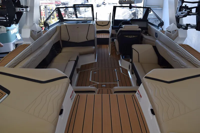 Slide: The Image of Luxurious interior of 2026 Nautique Super Air Nautique G25 Paragon boat with plush seating. - 5