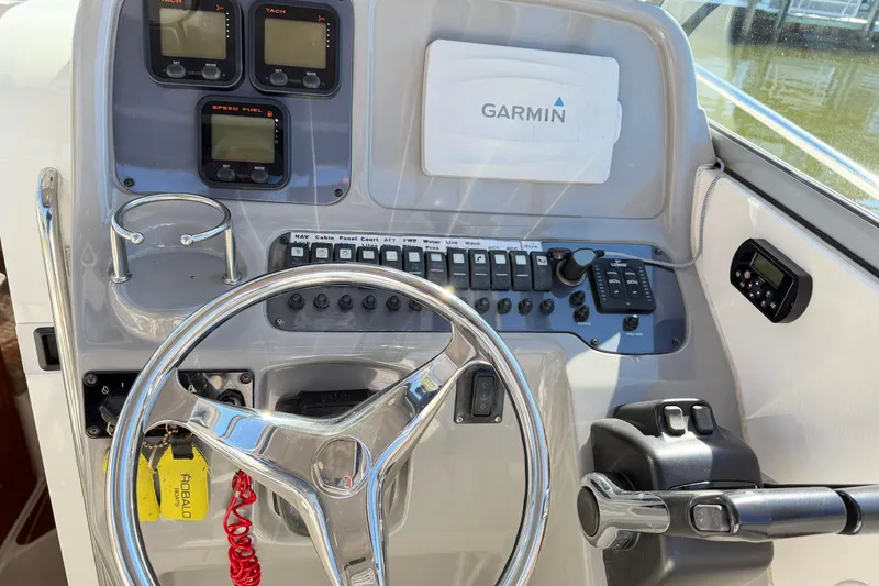 Slide: The Image of Control panel of 2014 Robalo R245 Walkaround boat with Garmin navigation system. - 20