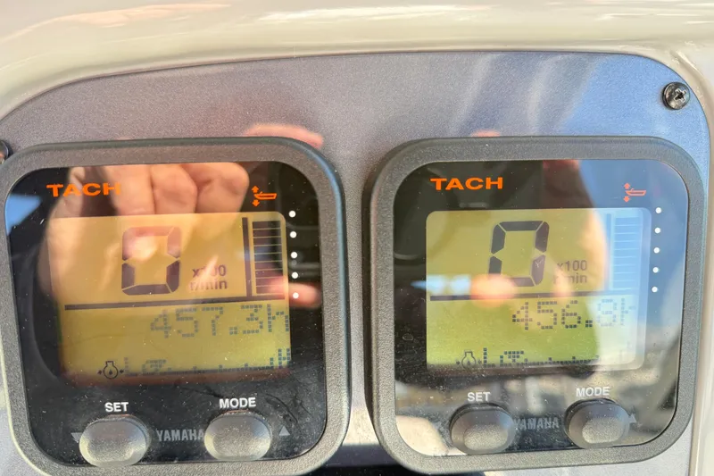 Slide: The Image of Tachometer display on 2014 Robalo R245 Walkaround boat, showing engine hours. - 22