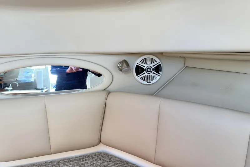 Slide: The Image of Interior of 2014 Robalo R245 Walkaround boat with speaker and seating. - 32