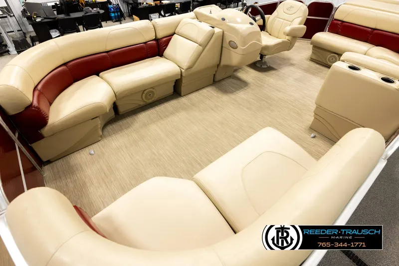 Slide: The Image of 2018 Misty Harbor 2085 CR pontoon boat interior with beige and red seating. - 10