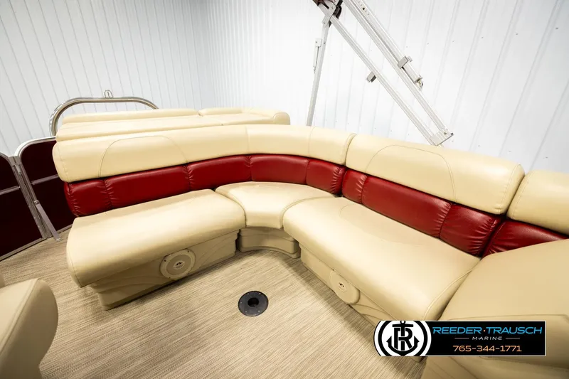 Slide: The Image of Luxurious seating on 2018 Misty Harbor 2085 CR pontoon boat, featuring beige and red upholstery. - 20