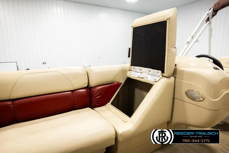 Slide: The Image of 2018 Misty Harbor 2085 CR boat interior with beige and red seating. - 26