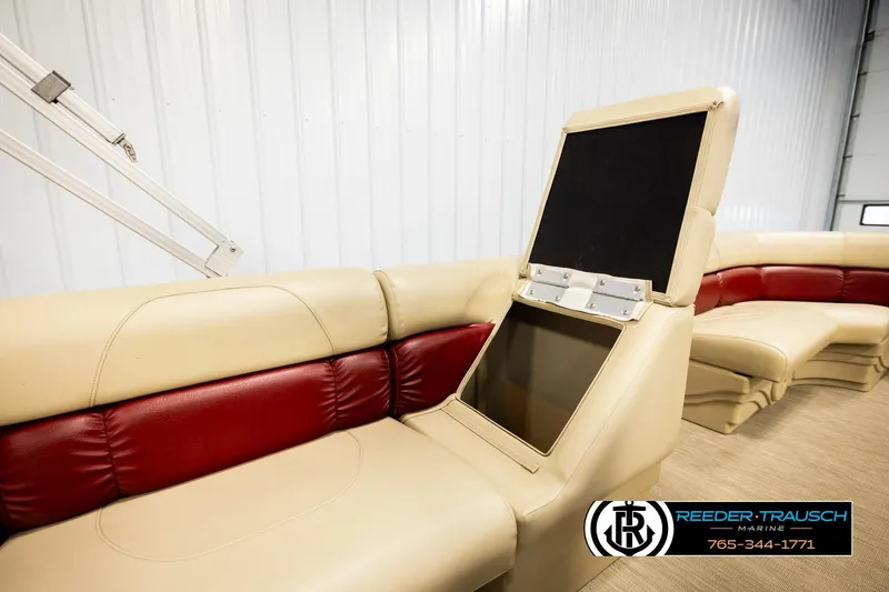 Slide: The Image of 2018 Misty Harbor 2085 CR boat interior with beige and red seating, storage compartment open. - 28