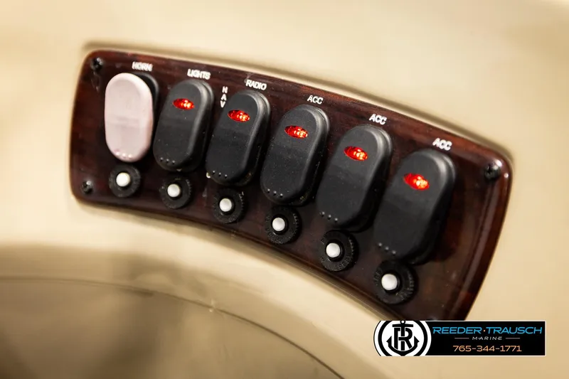 Slide: The Image of Control panel of 2018 Misty Harbor 2085 CR boat with labeled switches. - 36