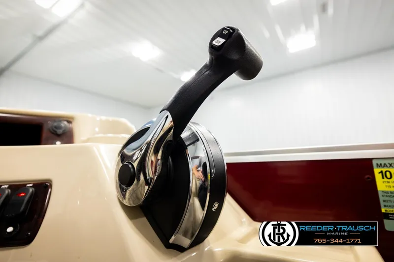 Slide: The Image of Close-up of 2018 Misty Harbor 2085 CR boat throttle control in a showroom. - 37