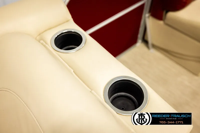 Slide: The Image of Close-up of 2018 Misty Harbor 2085 CR boat's beige seating with cup holders. - 44