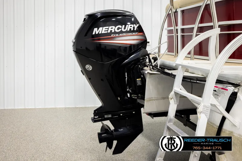 Slide: The Image of 2018 Misty Harbor 2085 CR with Mercury FourStroke outboard motor, displayed indoors. - 45