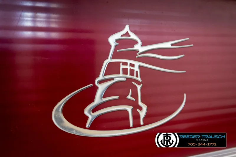 Slide: The Image of Red Misty Harbor 2085 CR boat with lighthouse logo, 2018 model, Reeder-Trausch Marine branding. - 50