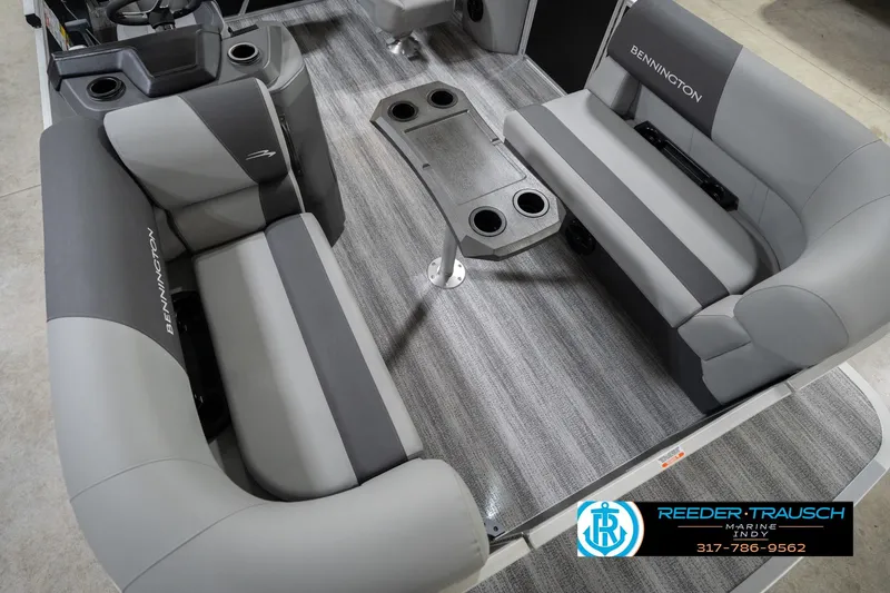 Slide: The Image of 2026 Bennington 20 SSB pontoon boat interior with gray seating and cup holders. - 13