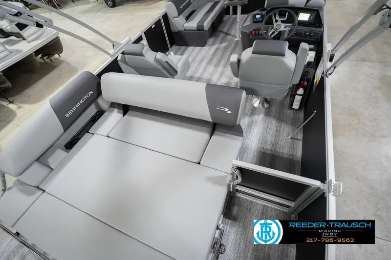 Slide: The Image of 2026 Bennington 20 SSB pontoon boat interior with gray seating and modern helm. - 14