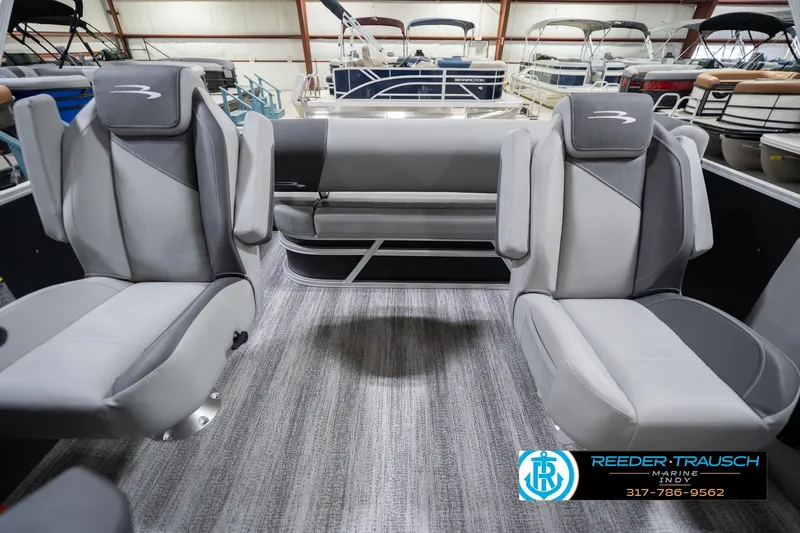 Slide: The Image of 2026 Bennington 20 SSB boat interior with gray seating and modern design. - 17