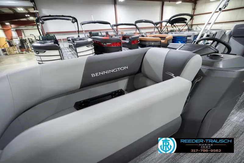 Slide: The Image of 2026 Bennington 20 SSB pontoon boat interior at Reeder-Trausch Marine showroom. - 24