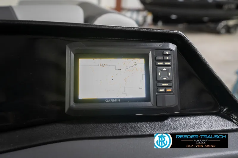 Slide: The Image of Garmin navigation system on 2026 Bennington 20 SSB boat dashboard, Reeder-Trausch Marine logo visible. - 35