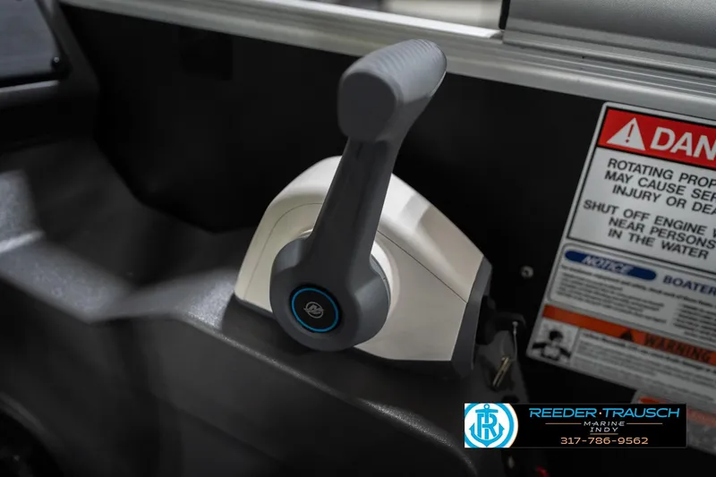 Slide: The Image of Throttle control of 2026 Bennington 20 SSB boat with safety warning label. - 37