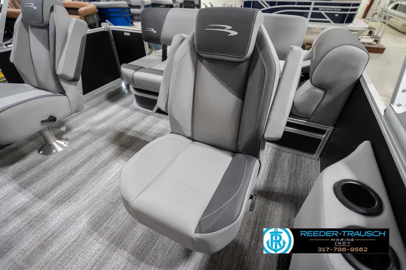 Slide: The Image of 2026 Bennington 20 SSB boat interior with gray seating and modern design. - 42