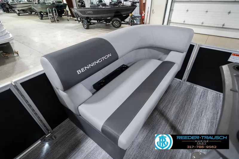 Slide: The Image of 2026 Bennington 20 SSB boat interior with gray seating in showroom. - 44