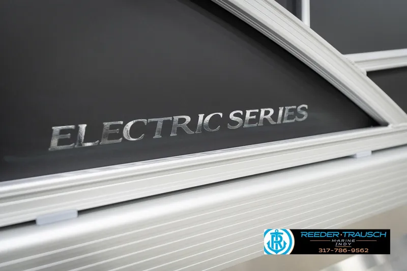 Slide: The Image of 2026 Bennington 20 SSB Electric Series boat detail with Reeder-Trausch Marine logo. - 48