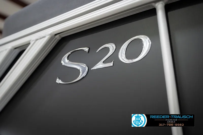 Slide: The Image of 2026 Bennington 20 SSB boat with "S20" emblem, Reeder-Trausch Marine logo visible. - 49