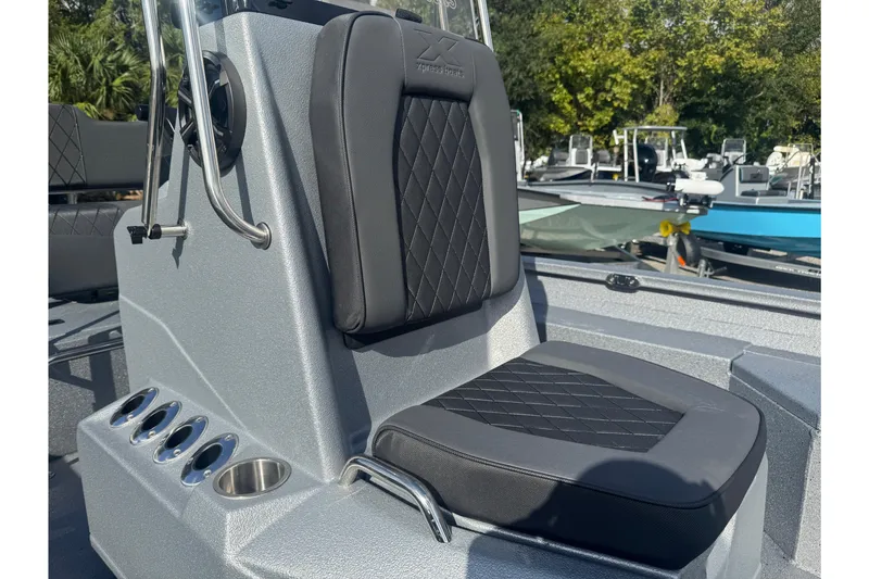 Slide: The Image of 2026 Xpress H20B Bay boat seat with diamond stitching and cup holders. - 16