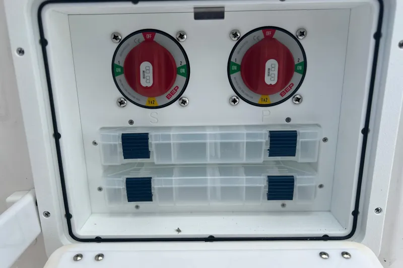 Slide: The Image of Battery switches on a 2026 Sea Fox 268 Commander boat, featuring dual control dials. - 12