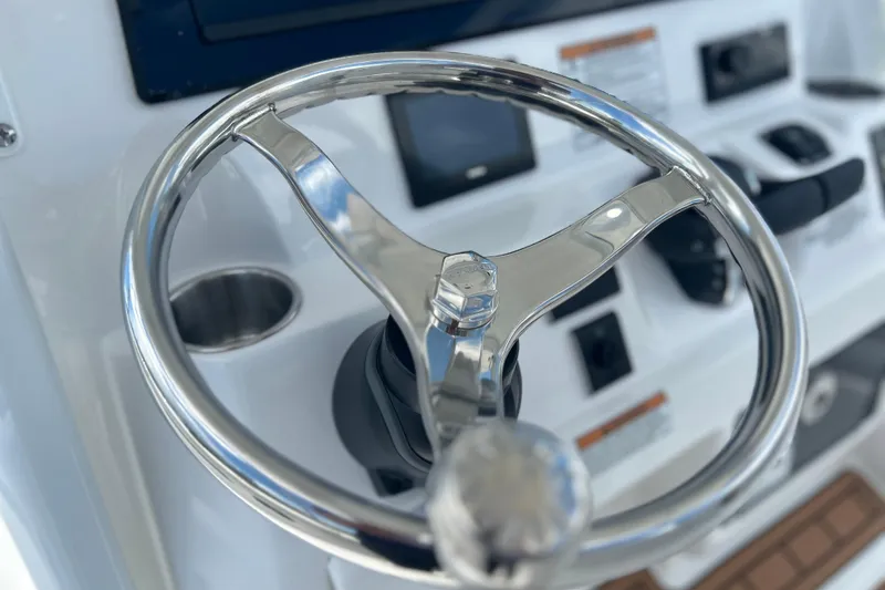 Slide: The Image of Steering wheel of 2026 Sea Fox 268 Commander boat, showcasing modern controls. - 4