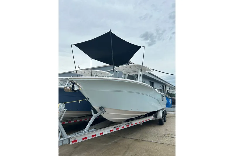 Slide: The Image of 2026 Sea Fox 268 Commander boat on trailer with canopy, ready for adventure. - 54