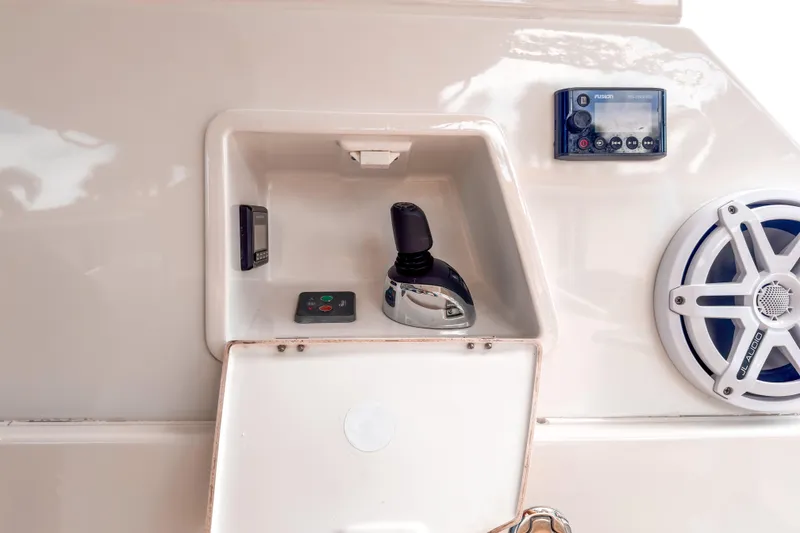 Slide: The Image of Control panel of a 2015 Beneteau Gran Turismo 49 yacht with audio system and joystick. - 10