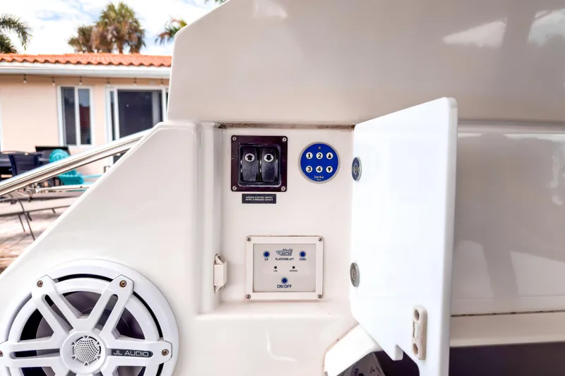 Slide: The Image of Control panel on 2015 Beneteau Gran Turismo 49 yacht, featuring audio system and switches. - 11