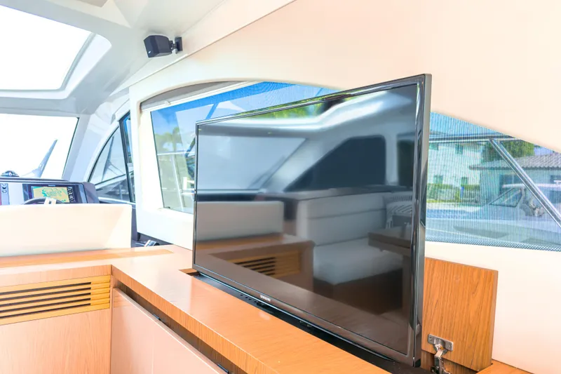 Slide: The Image of Interior of 2015 Beneteau Gran Turismo 49 yacht with modern TV and navigation system. - 21