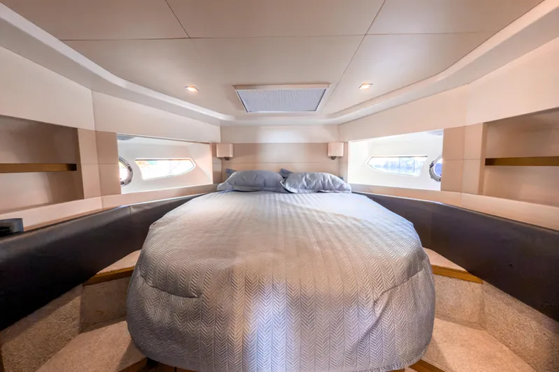 Slide: The Image of Luxurious bedroom interior of 2015 Beneteau Gran Turismo 49 yacht with elegant bedding. - 32