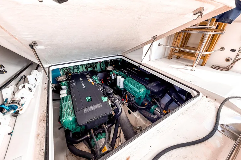 Slide: The Image of Engine compartment of 2015 Beneteau Gran Turismo 49 yacht, showcasing dual Volvo Penta engines. - 35