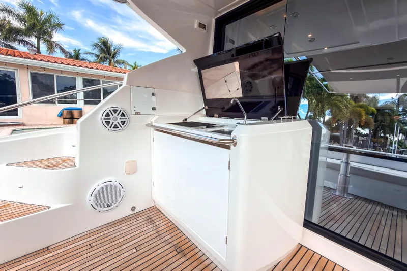 Slide: The Image of 2015 Beneteau Gran Turismo 49 yacht deck with outdoor entertainment area. - 7