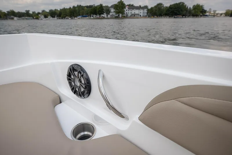 Slide: The Image of 2021 Hurricane SunDeck Sport 205 IO boat on display, featuring sleek design and spacious deck. - 4