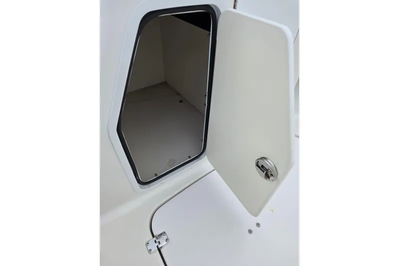 Slide: The Image of Open storage compartment on 2012 Hurricane SunDeck 2000 OB boat. - 17