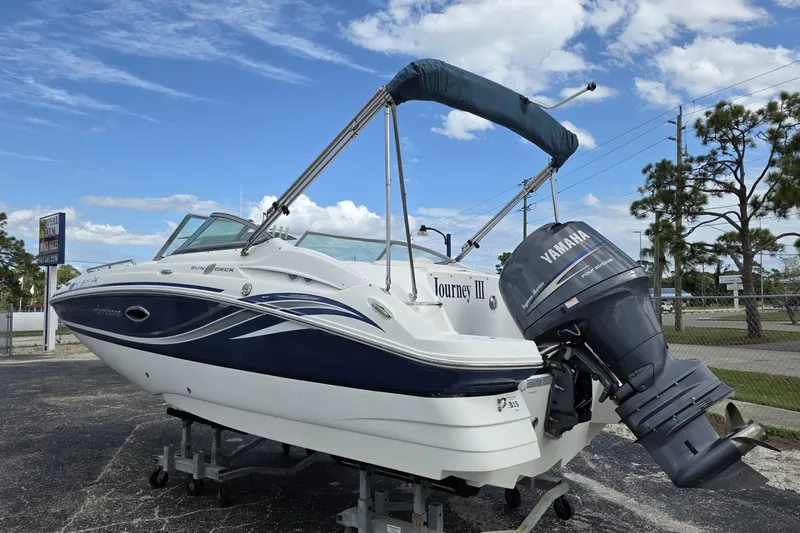 Slide: The Image of 2012 Hurricane SunDeck 2000 OB boat with Yamaha outboard motor on display. - 6