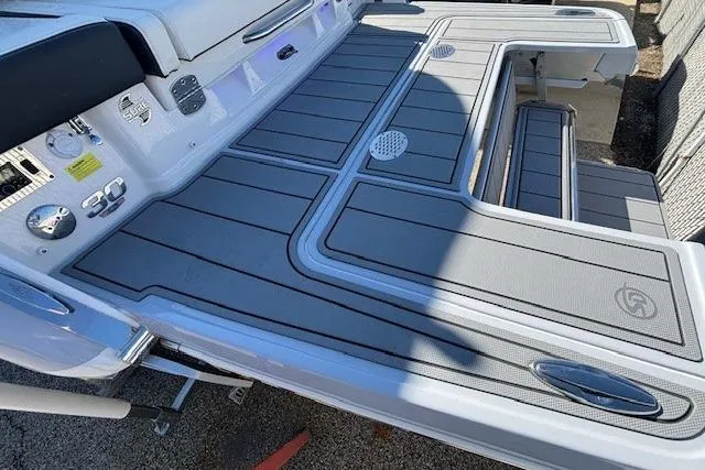 Slide: The Image of 2024 Chaparral 30 Surf boat deck with sleek design and modern features. - 19