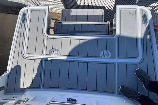 Slide: The Image of 2024 Chaparral 30 Surf boat deck with sleek design and modern features. - 20