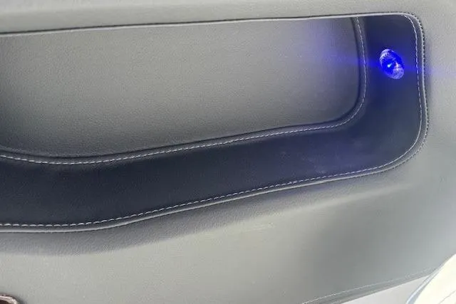 Slide: The Image of 2024 Chaparral 30 Surf boat deck with sleek design and modern features. - 25