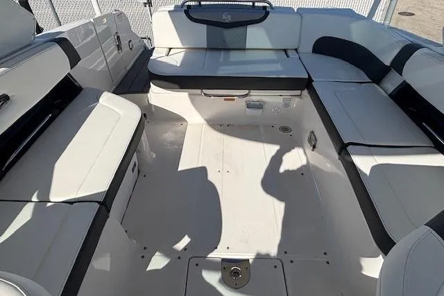 Slide: The Image of 2024 Chaparral 30 Surf boat interior with spacious seating and modern design. - 33