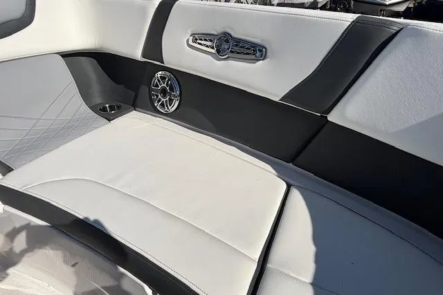 Slide: The Image of 2024 Chaparral 30 Surf boat interior with luxurious seating and modern design. - 36