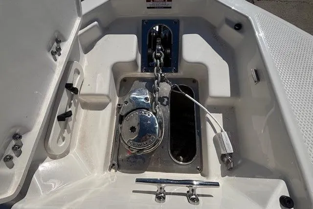 Slide: The Image of 2024 Chaparral 30 Surf boat interior with stylish seating and speaker detail. - 37