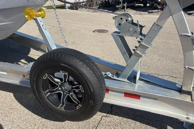 Slide: The Image of 2024 Chaparral 30 Surf boat with Zipwake trim system and propeller detail. - 41