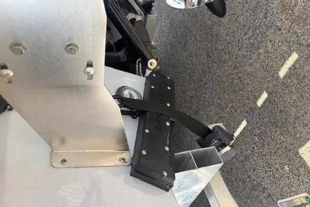 Slide: The Image of 2024 Chaparral 30 Surf boat propeller and outdrive close-up. - 44