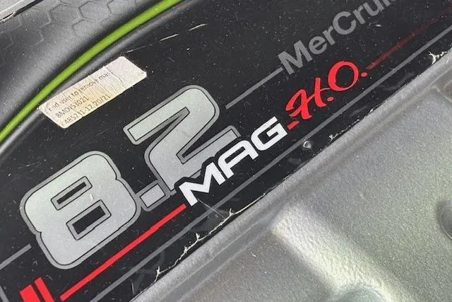 Slide: The Image of 2024 Chaparral 30 Surf engine compartment showcasing powerful V8 engine components. - 6