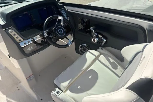 Slide: The Image of 2024 Chaparral 30 Surf boat engine detail, featuring 8.2 MAG H.O. branding. - 7