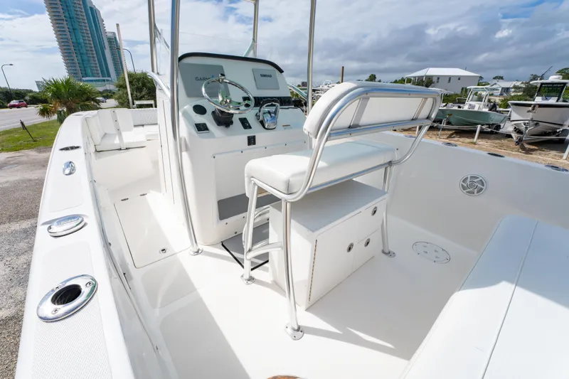 Slide: The Image of 2019 Twin Vee 240 GFX CC boat interior with console and seating. - 27
