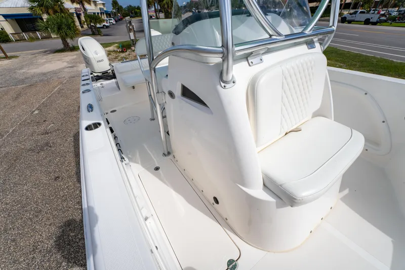 Slide: The Image of 2019 Twin Vee 240 GFX CC boat interior with white seating and console. - 30