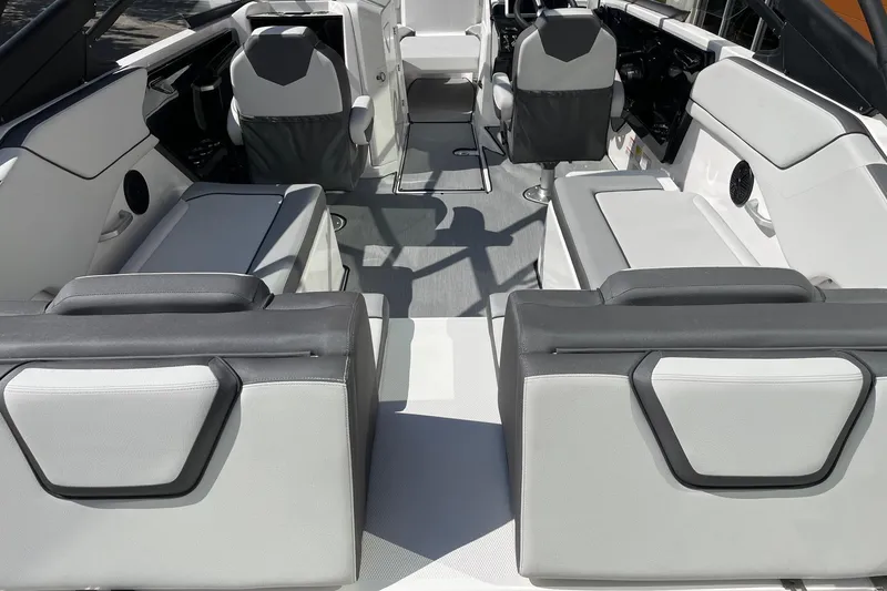 Slide: The Image of 2025 Yamaha Boats AR250 interior with modern seating and sleek design. - 4
